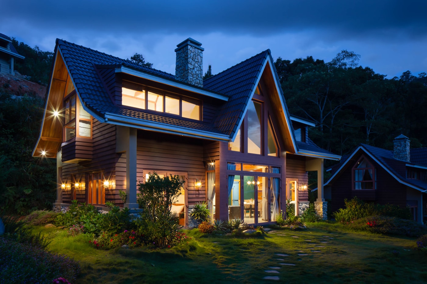 Warmly lit single-family home in the evening